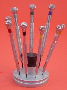 SCREW DRIVER SET ON STAND WITH SPARE BLADE