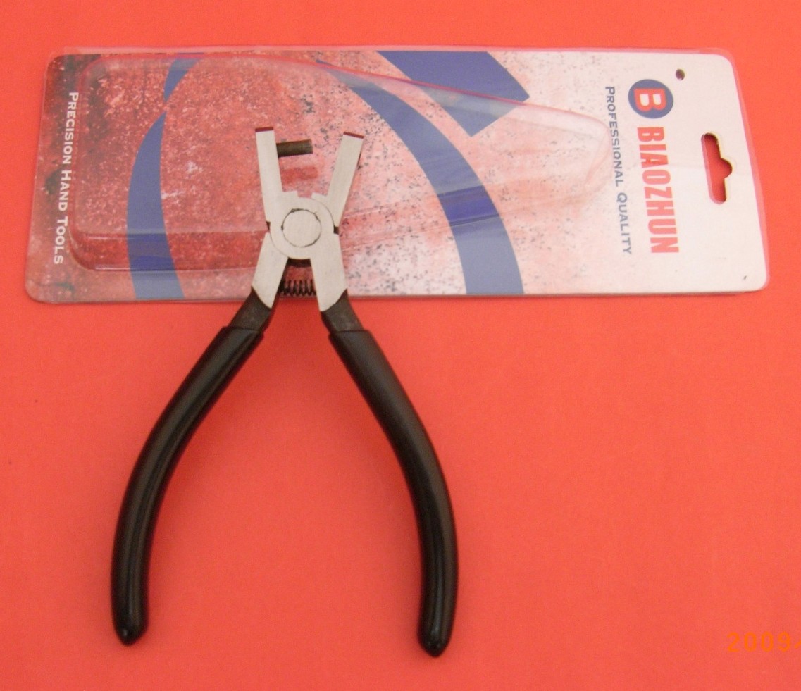 PLIER FOR PUNCHING OVAL SHAPE HOLES - Click Image to Close